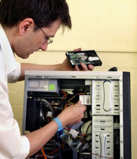 Engineer repairing desktop computer